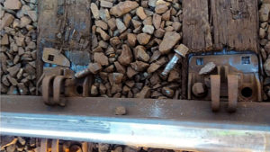 FILE - This June 2016 file photo provided by the Oregon Department of Transportation, shows south train rail tie plates and lag bolts at the site of a fiery June 3, 2016 train derailment in Mosier, Ore. Federal investigators on Thursday, June 23, 2016, blamed Union Pacific Railroad for the derailment along the Oregon-Washington border, saying the company failed to properly maintain its track. Preliminary findings on the derailment raise questions about why the company didn't find the broken bolts that triggered the wreck when it inspected the tracks right before the derailment. (Oregon Department of Transportation via AP, File) MANDATORY CREDIT