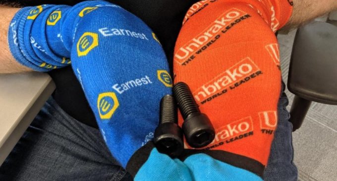 Orange & Blue Socks Announce Unbrako / Earnest Alliance